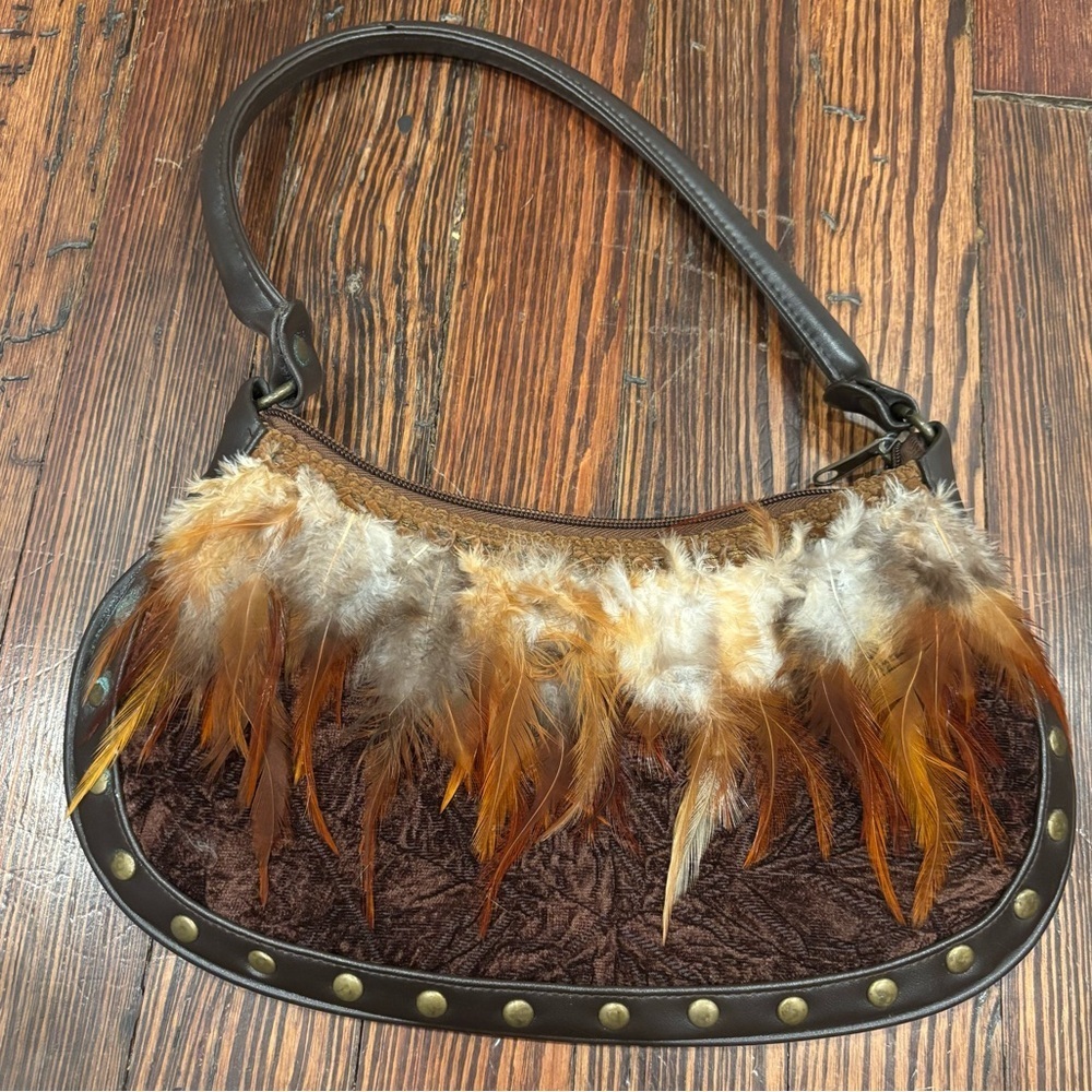 Prezzo Leather feathers And Crushed Velvet Handbag With Studs